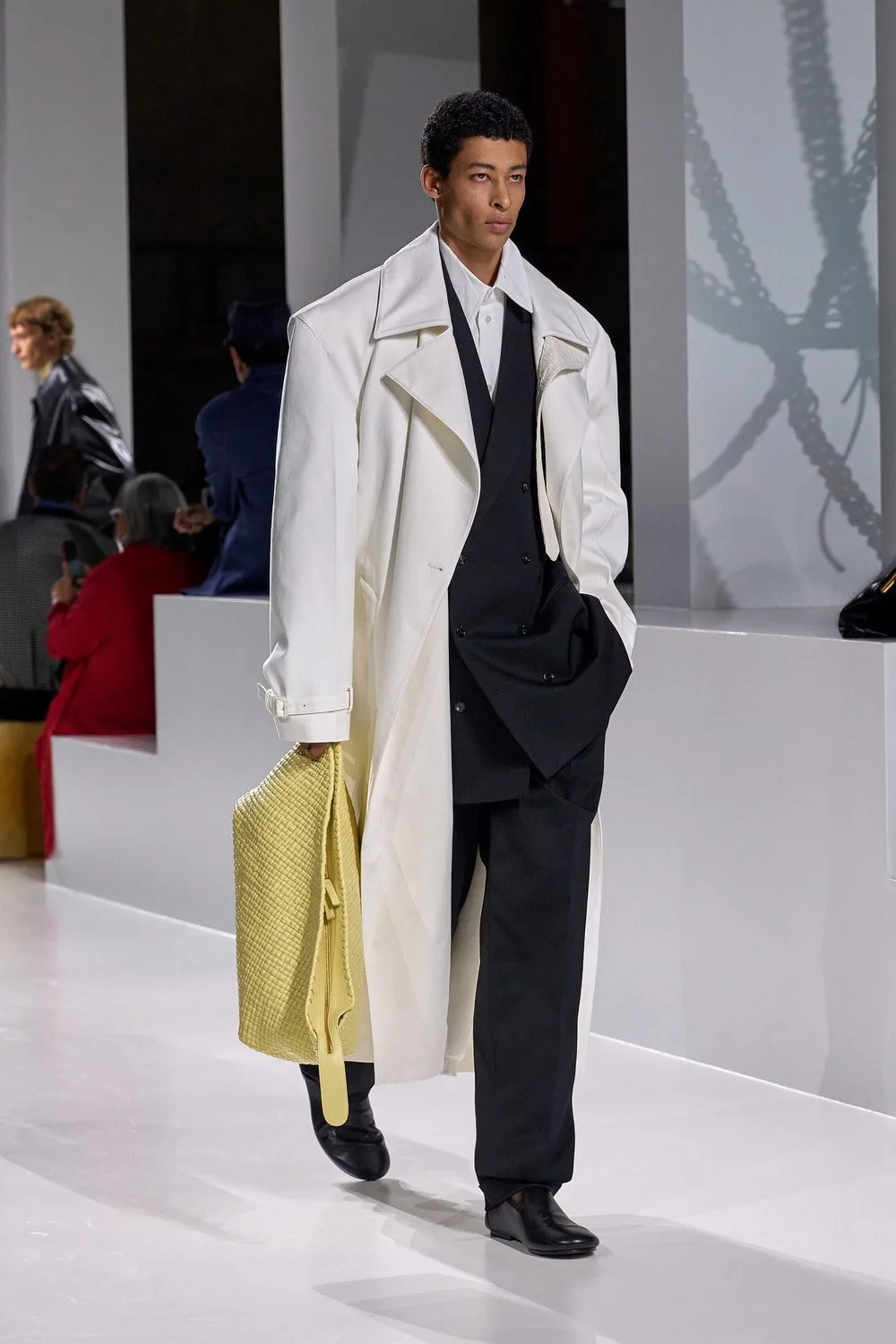 Model wearing a runway look for the men’s edit.